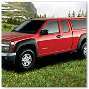 Red Truck Parked Next to Mountain